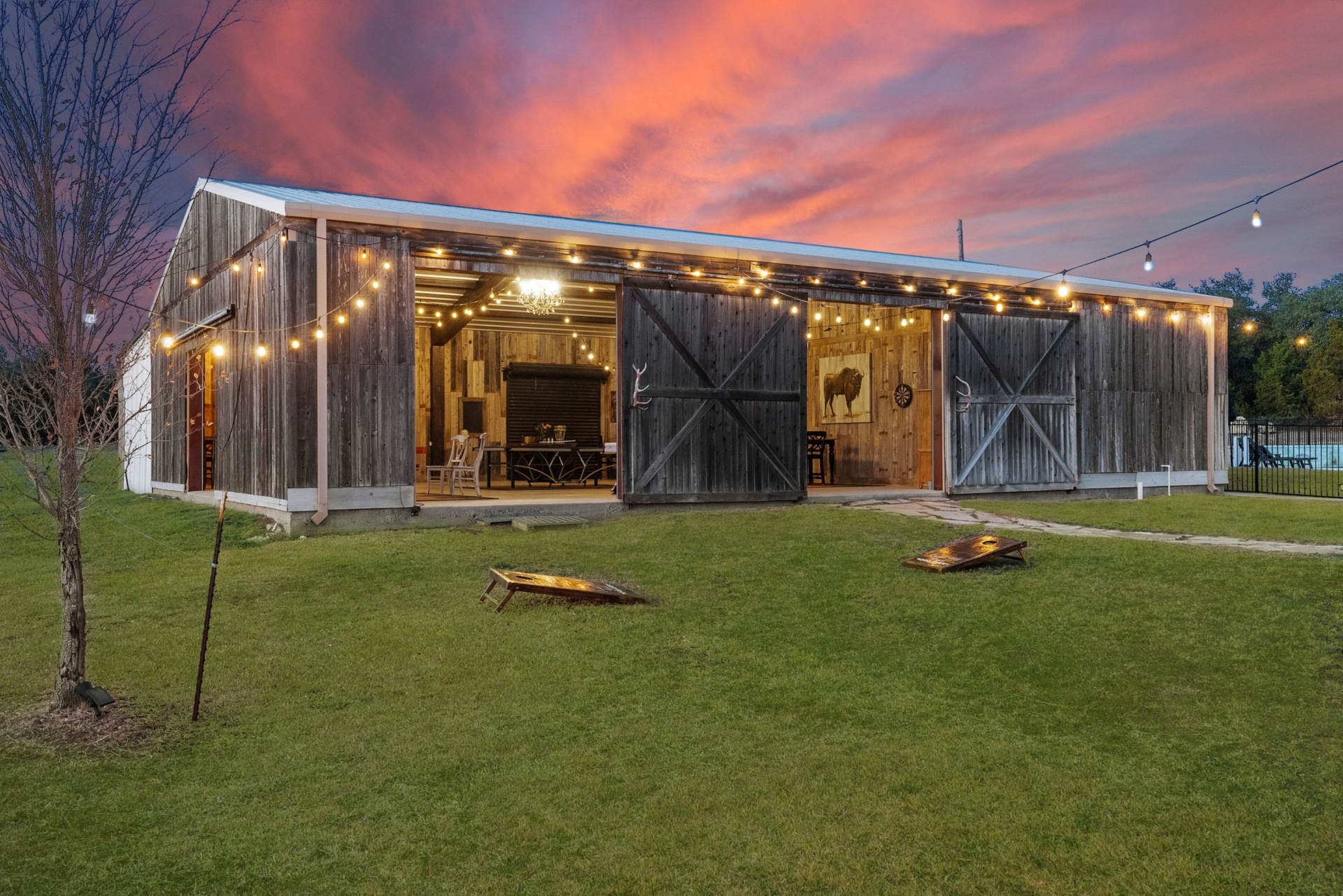 Game Barn Exterior at Sunset